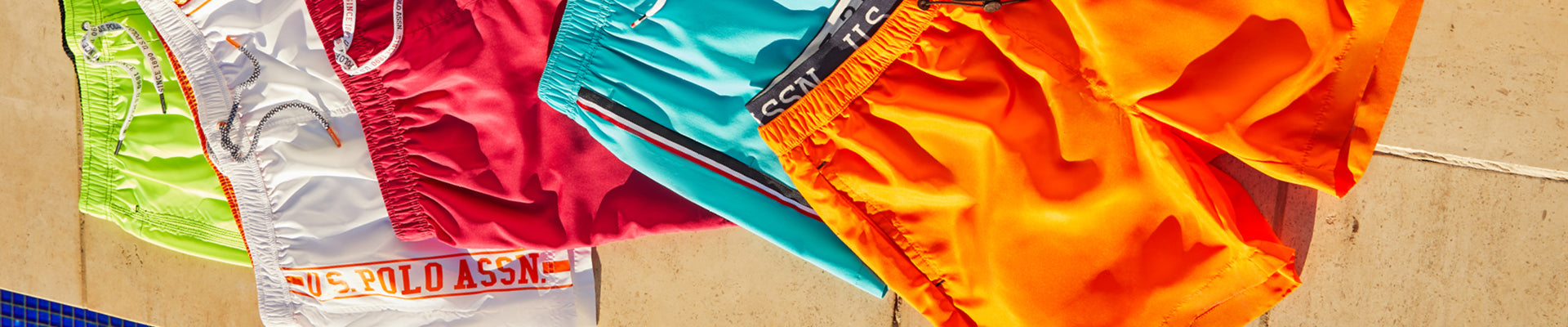 The USPA Men's swim shorts come in a range of colours and patterns and are designed for comfort with an elasticated waist for the perfect fit and an inner mesh for support. Featuring geometric, stripe, plain and signature print designs.
