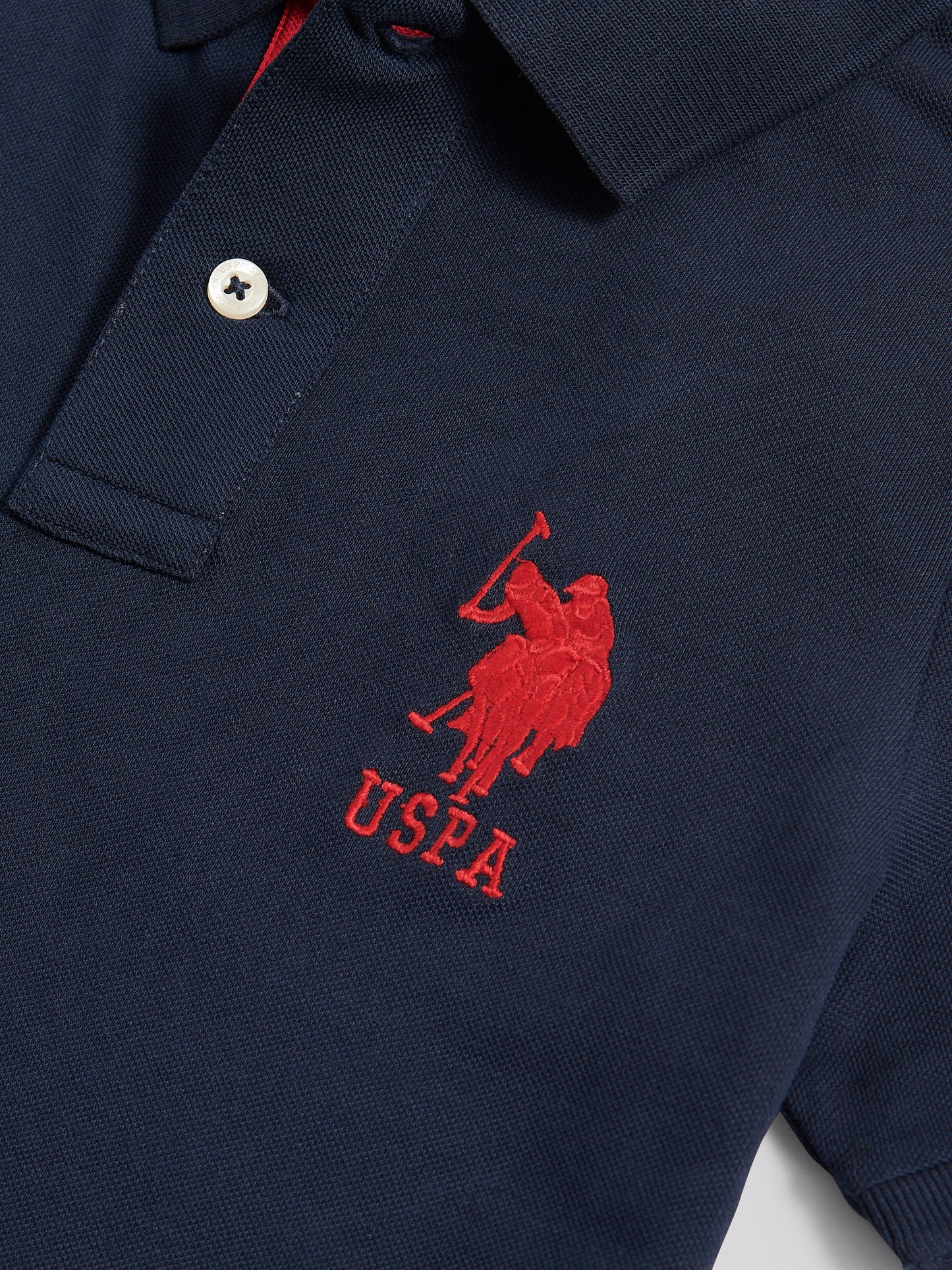 Boys Player 3 Polo Shirt in Dark Sapphire Navy / Haute Red DHM