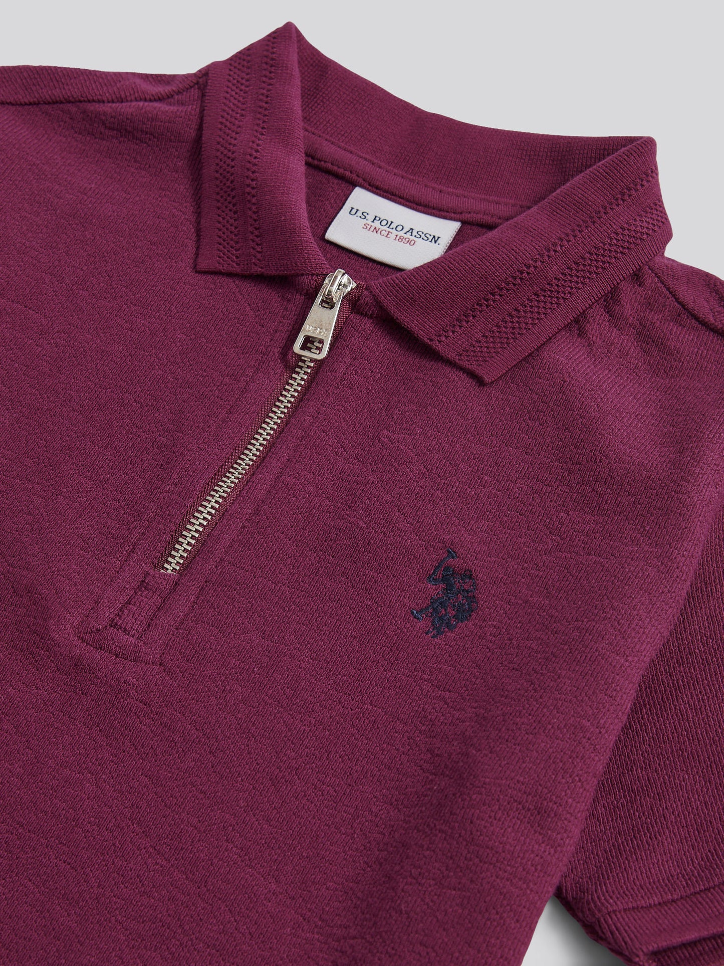 Boys Flat Pile Texture Zip Polo Shirt in Grape Wine
