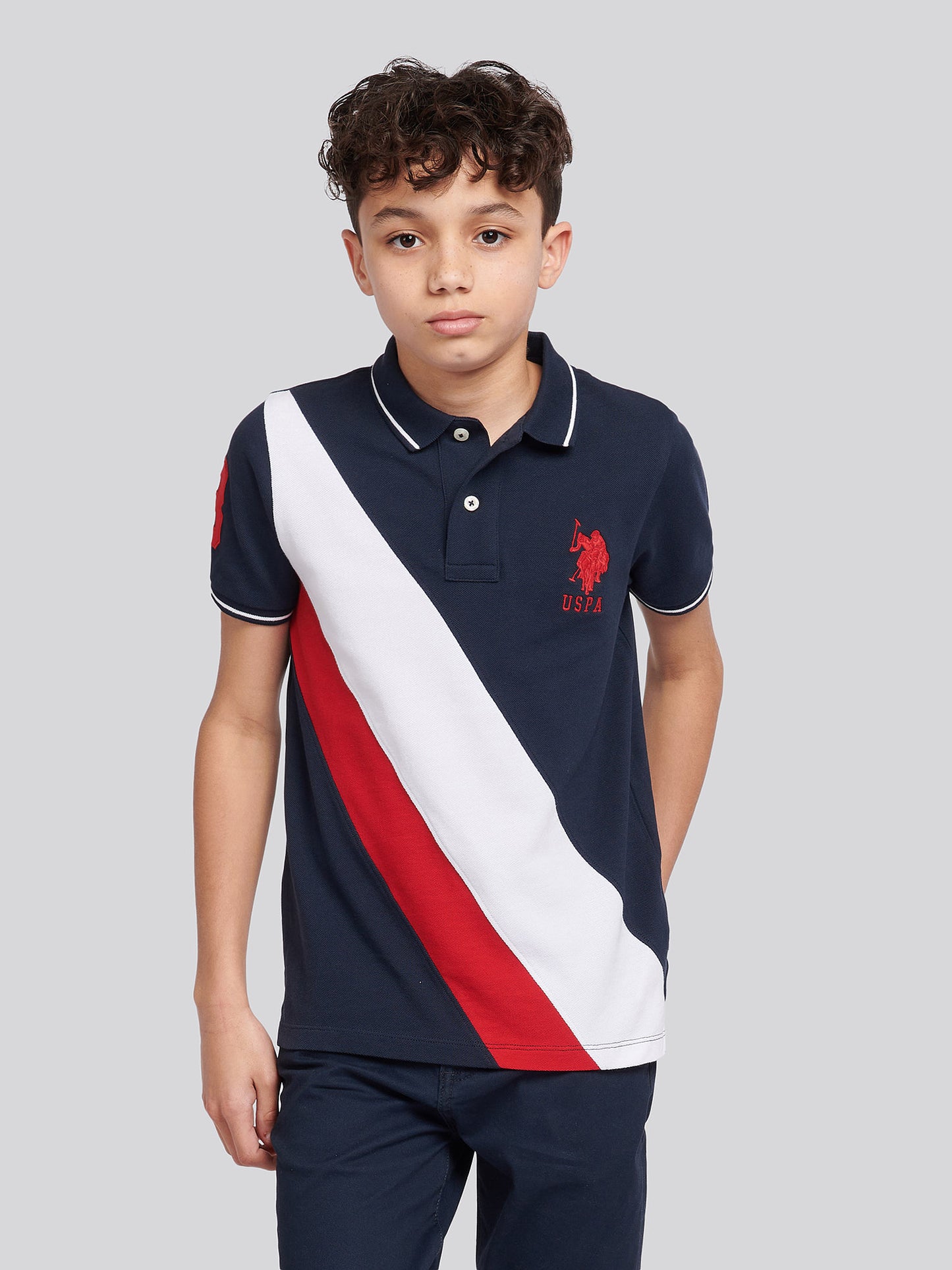 Boys Player 3 Sash Polo Shirt in Dark Sapphire Navy / Haute Red DHM