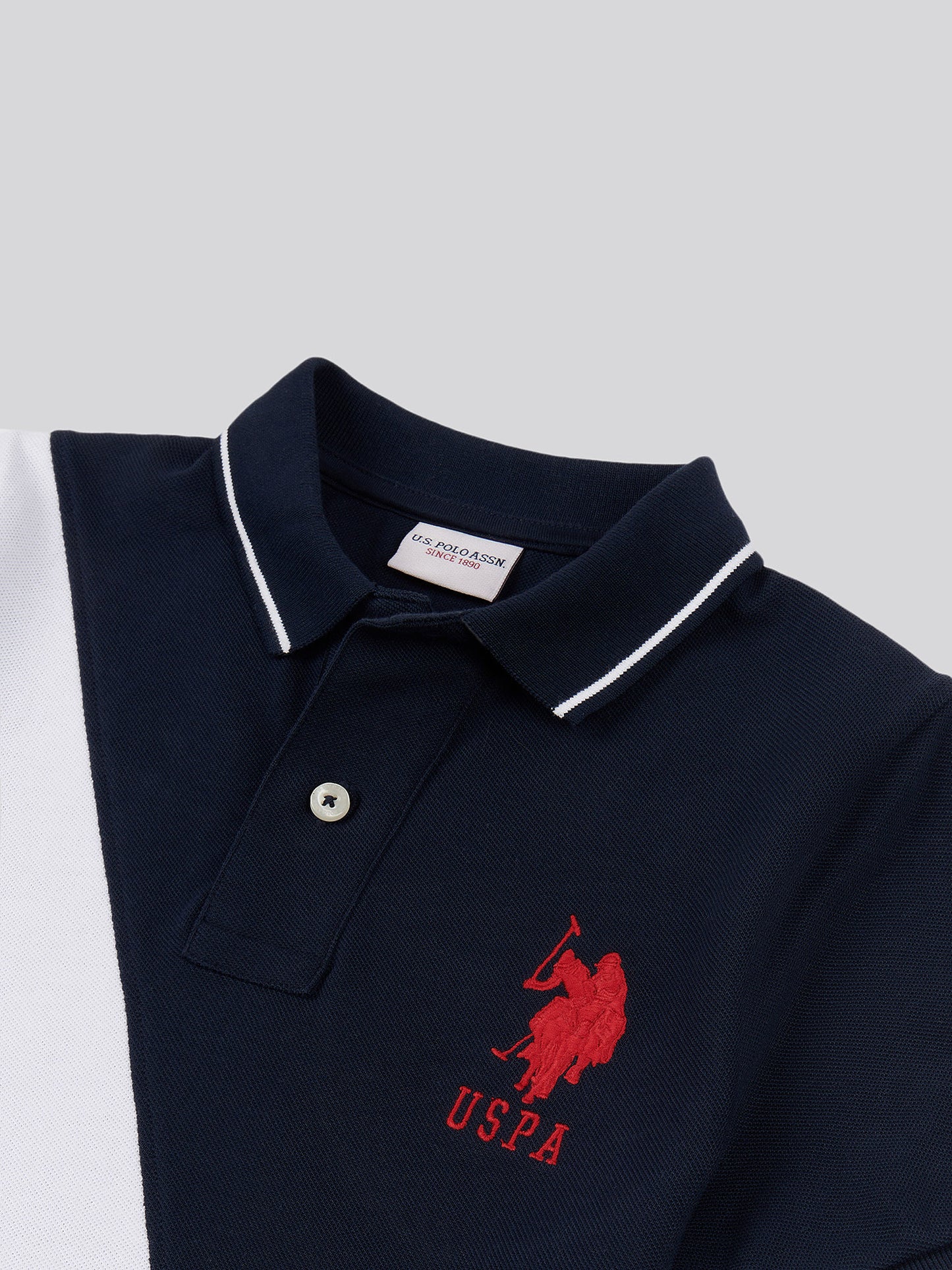 Boys Player 3 Sash Polo Shirt in Dark Sapphire Navy / Haute Red DHM
