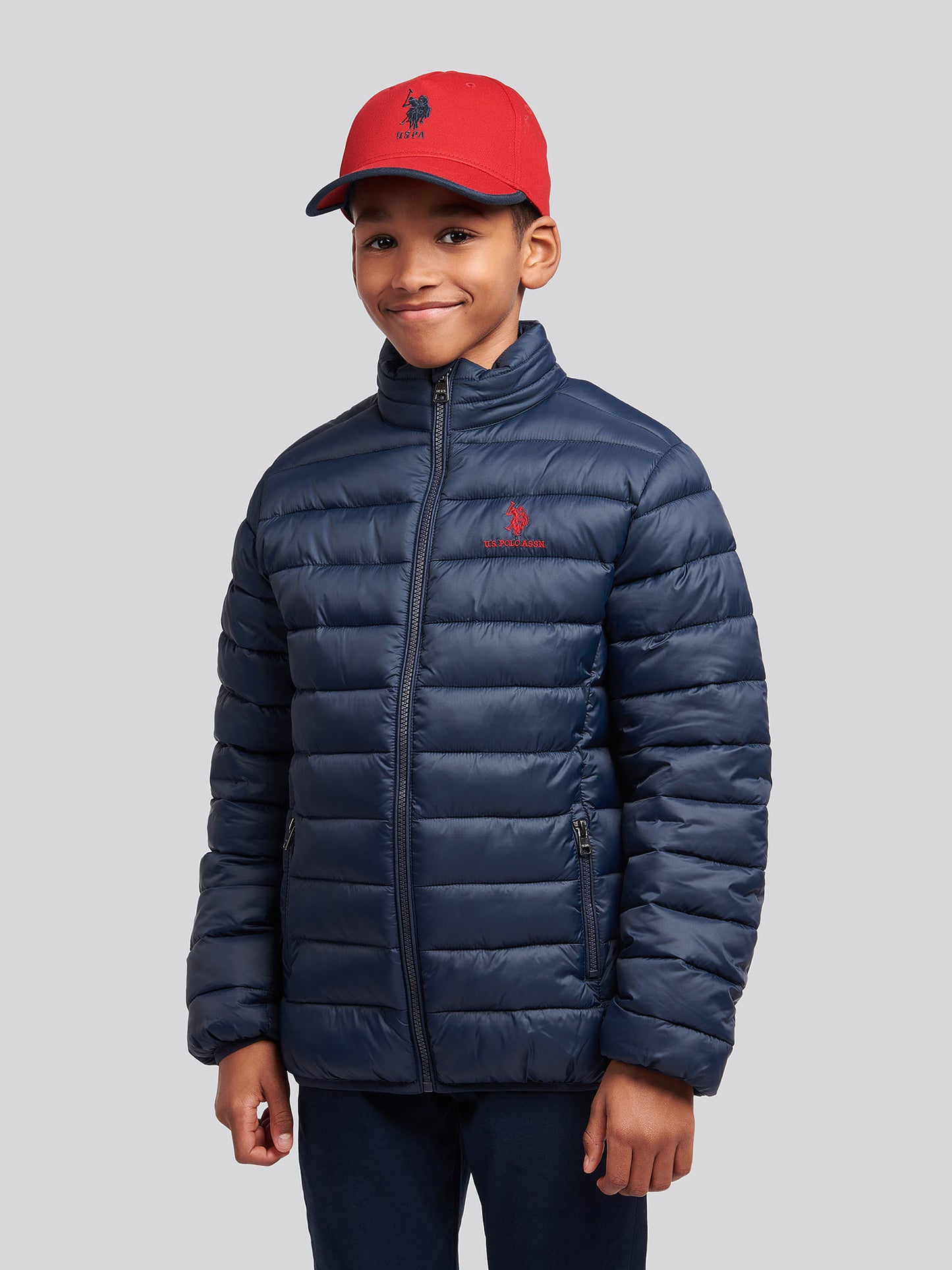Boys Lightweight Bound Quilted Jacket in Dark Sapphire Navy / Haute Red DHM