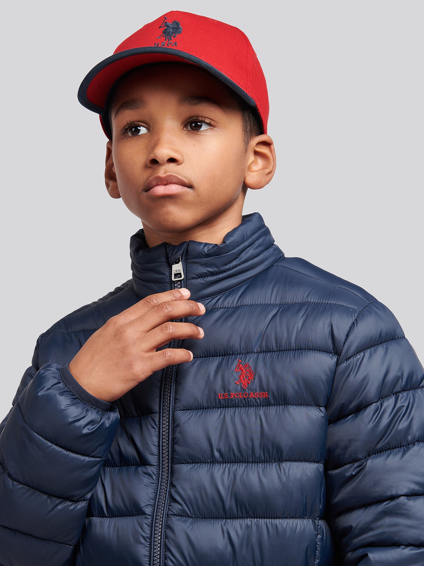 Boys Lightweight Bound Quilted Jacket in Dark Sapphire Navy / Haute Red DHM