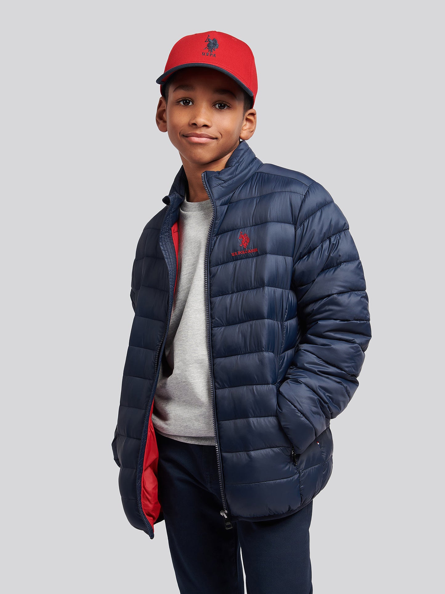Boys Lightweight Bound Quilted Jacket in Dark Sapphire Navy / Haute Red DHM