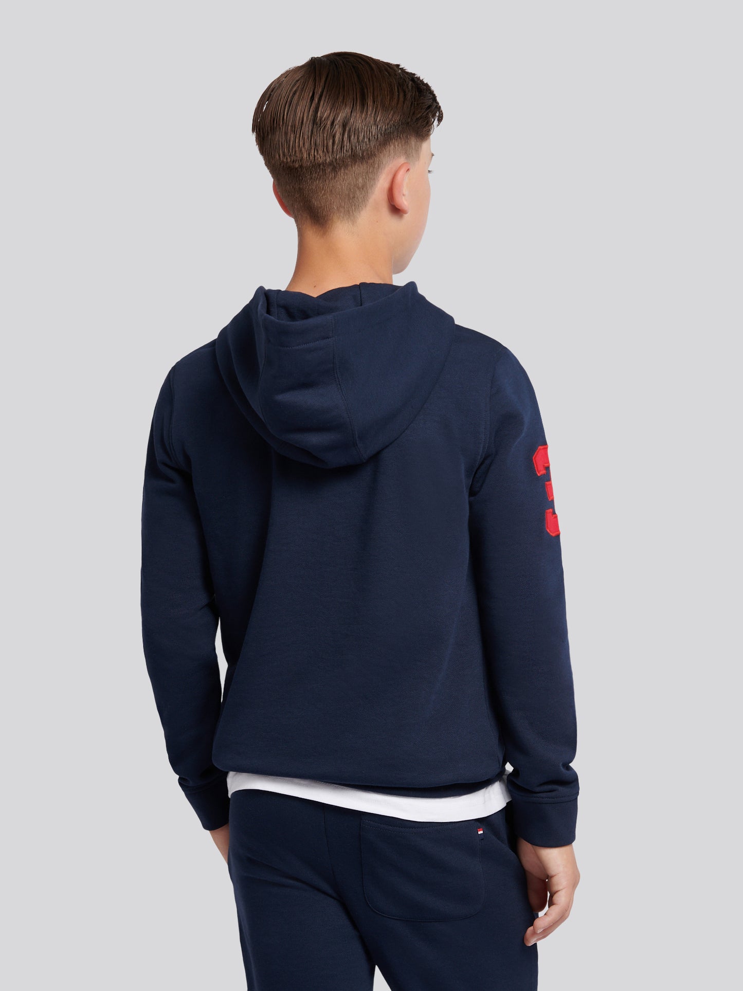 Boys Player 3 Brush Back Hoodie in Dark Sapphire Navy / Haute Red DHM