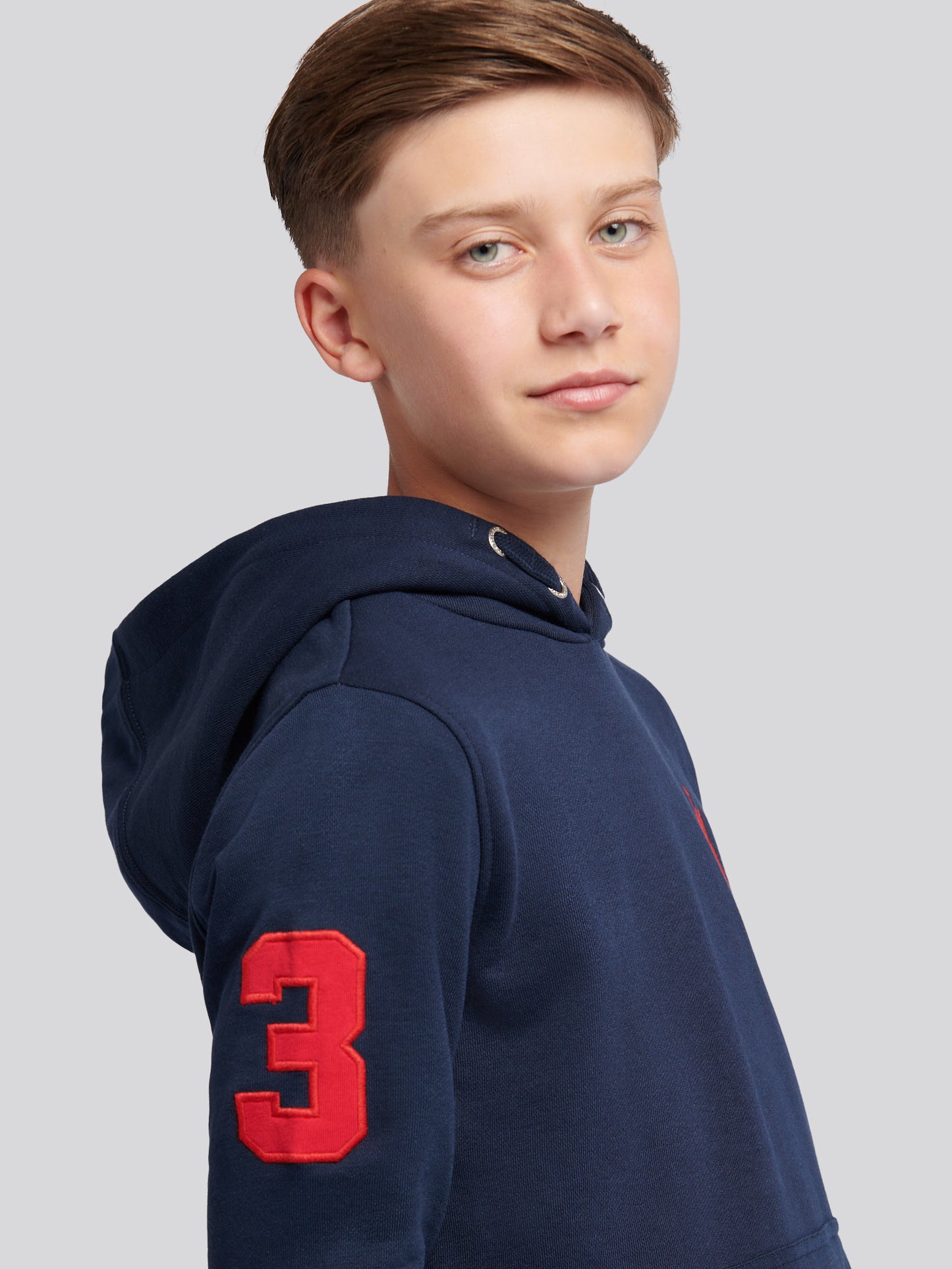 Boys Player 3 Brush Back Hoodie in Dark Sapphire Navy / Haute Red DHM