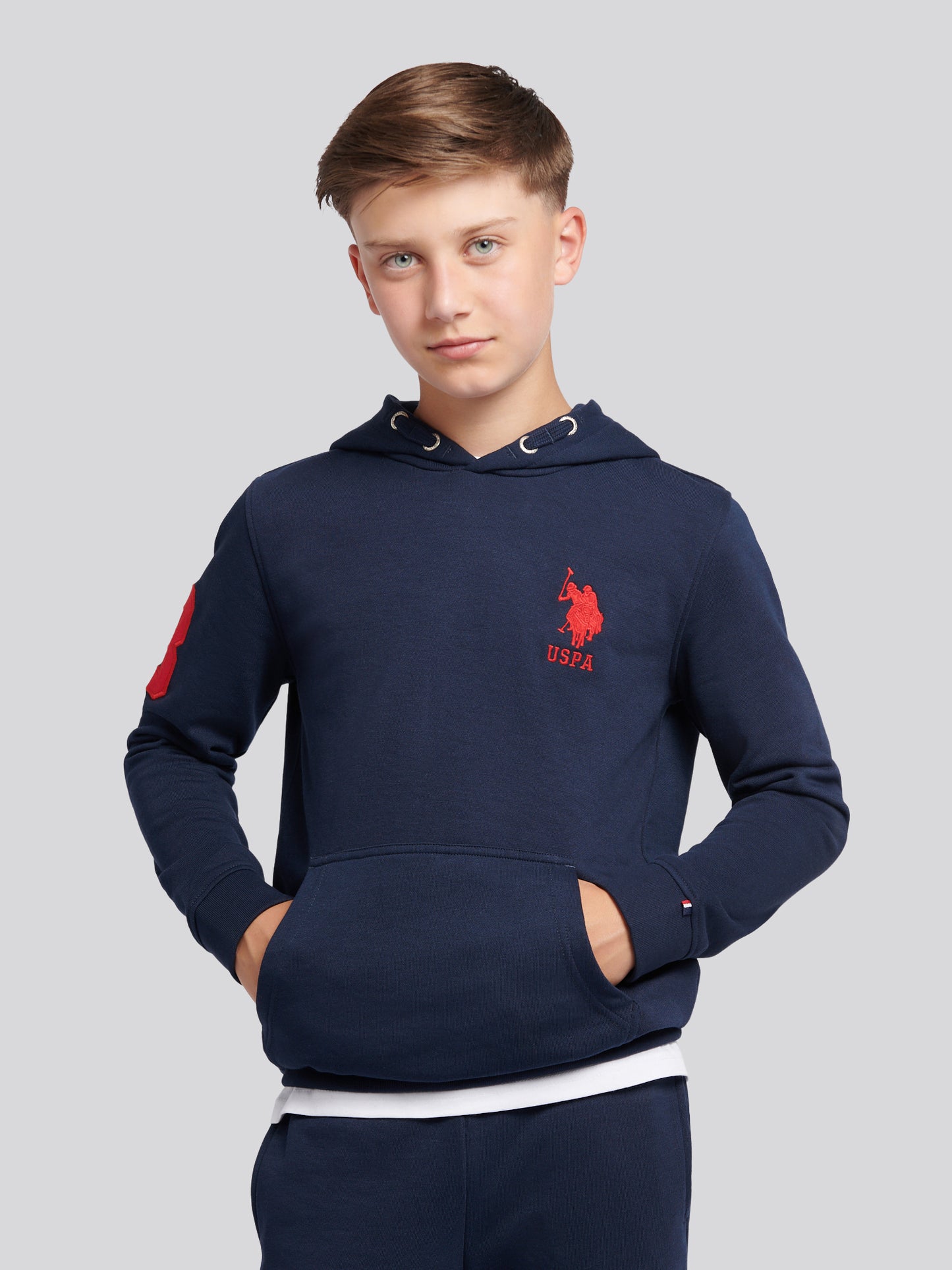 Boys Player 3 Brush Back Hoodie in Dark Sapphire Navy / Haute Red DHM