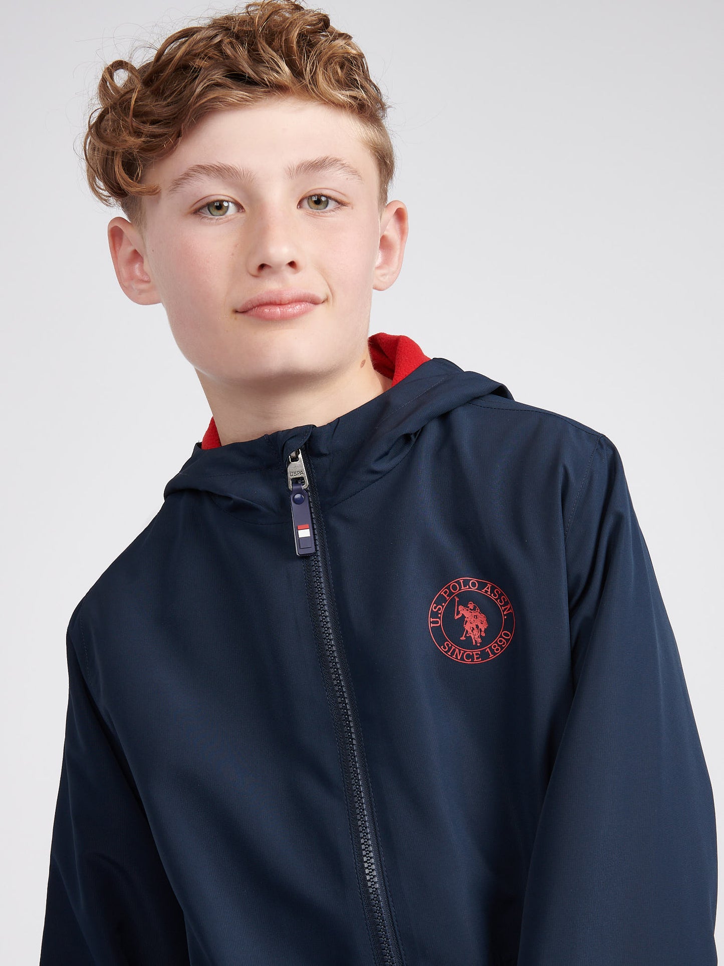 Boys Fleece Lined Windcheater in Dark Sapphire Navy / Haute Red DHM