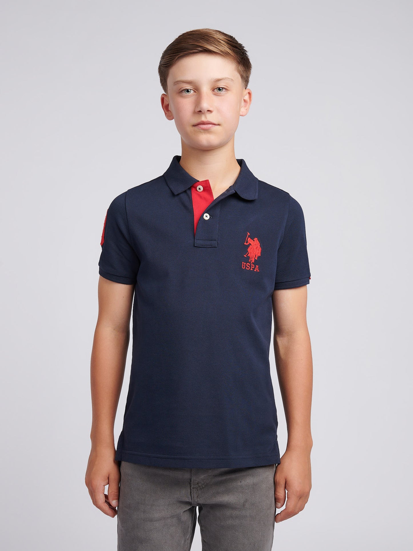 Boys Player 3 Polo Shirt in Dark Sapphire Navy / Haute Red DHM