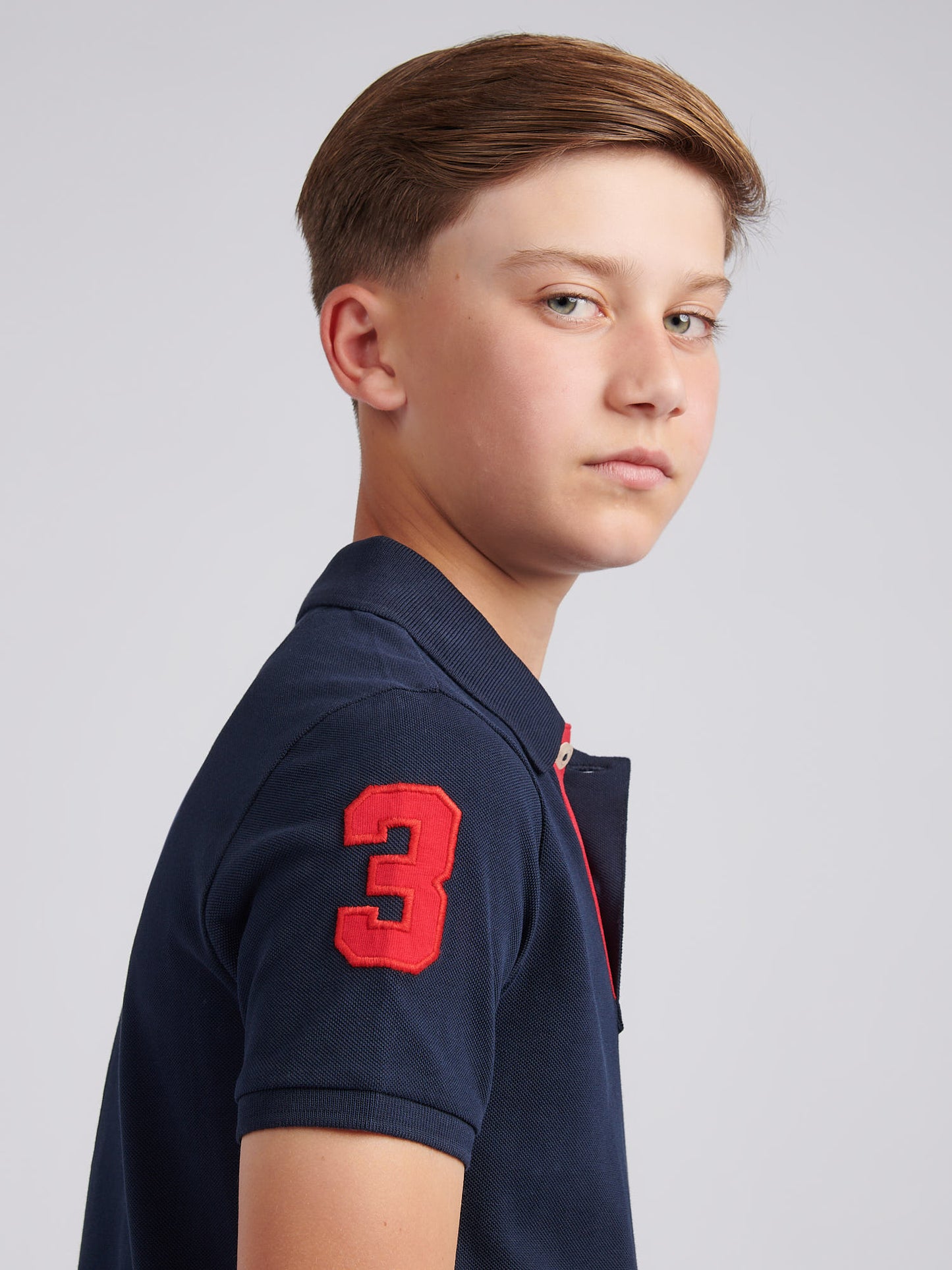 Boys Player 3 Polo Shirt in Dark Sapphire Navy / Haute Red DHM
