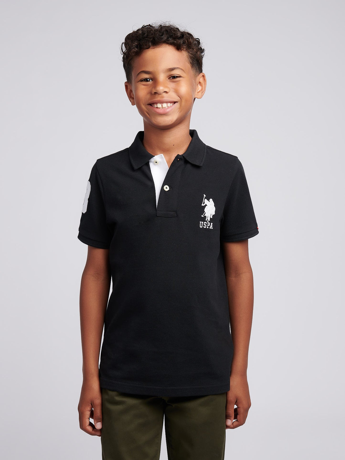 Boys Player 3 Polo Shirt in Black Bright White DHM