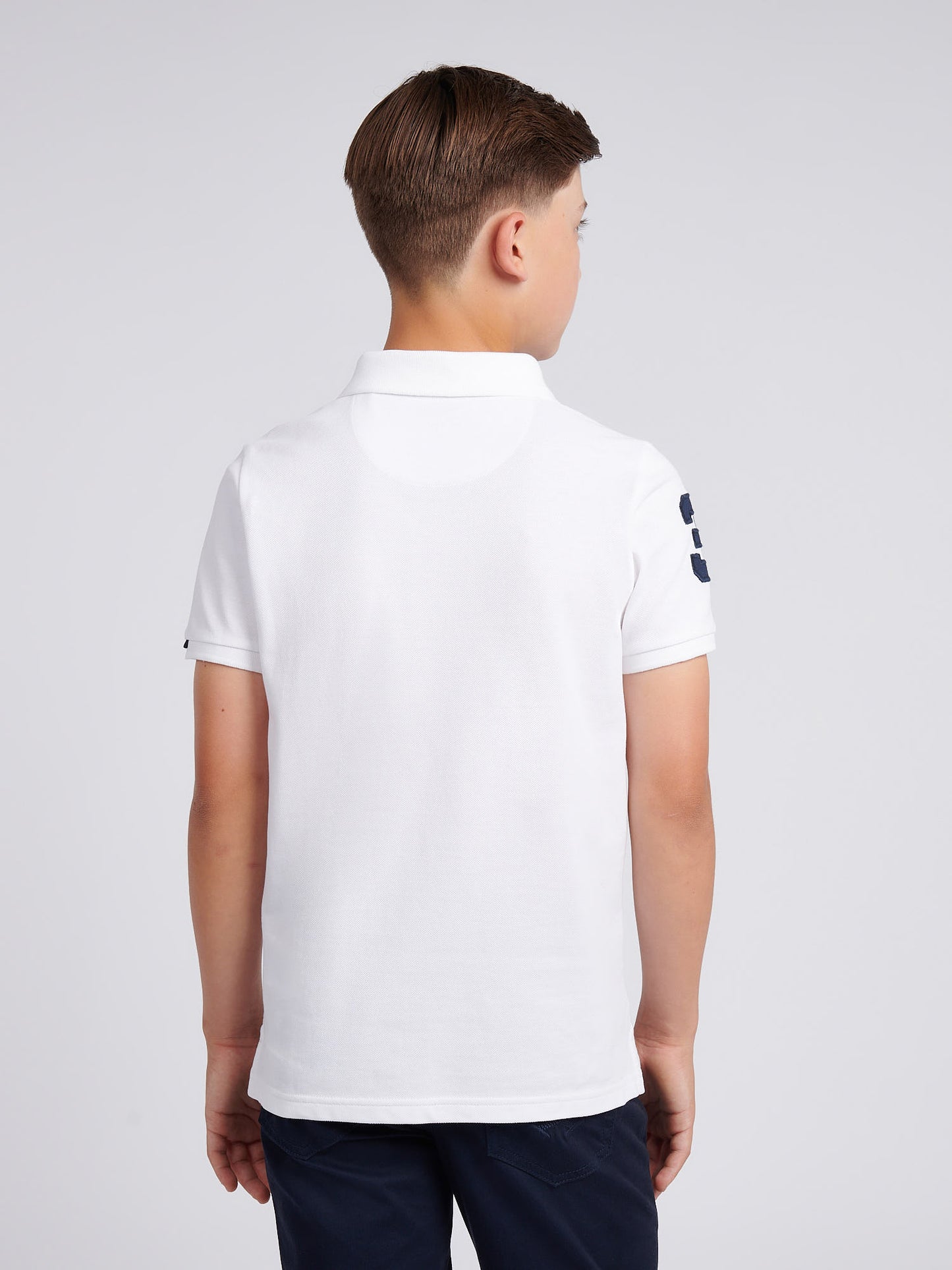 Boys Player 3 Polo Shirt in White / Dark Sapphire Navy DHM