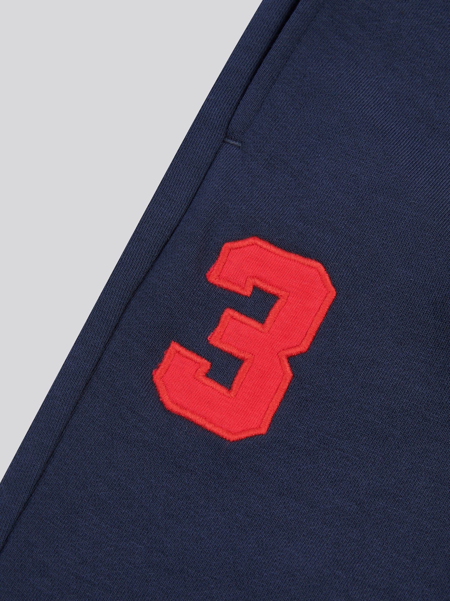 Boys Player 3 Loopback Jogger in Dark Sapphire Navy / Haute Red DHM