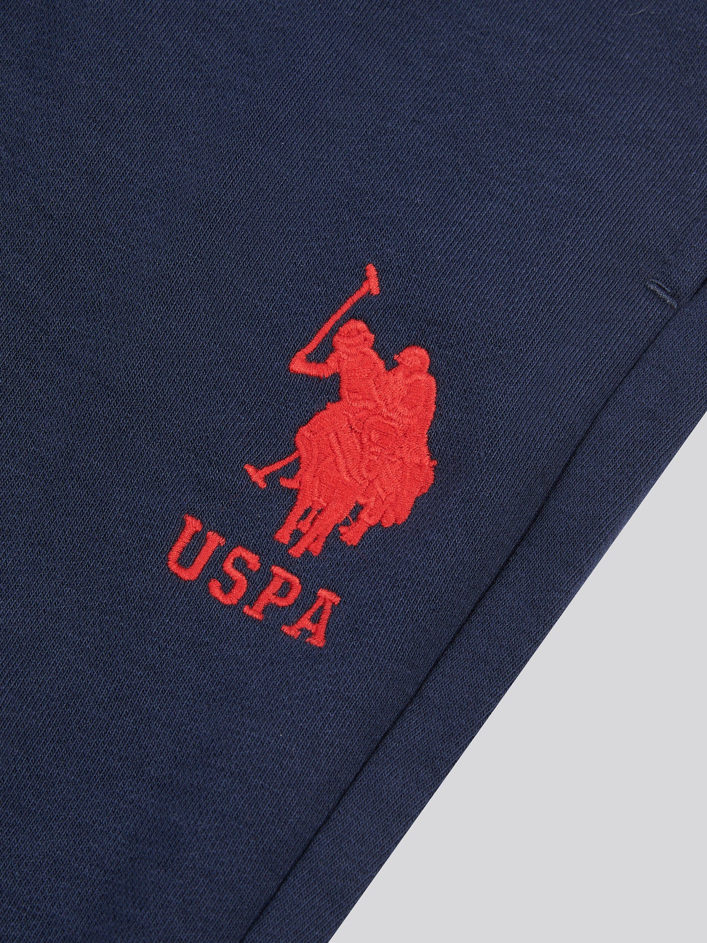 Boys Player 3 Loopback Jogger in Dark Sapphire Navy / Haute Red DHM