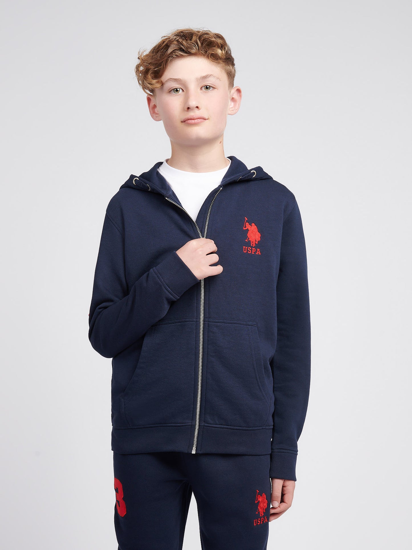 Boys Player 3 Zip Hoodie in Dark Sapphire Navy / Haute Red DHM