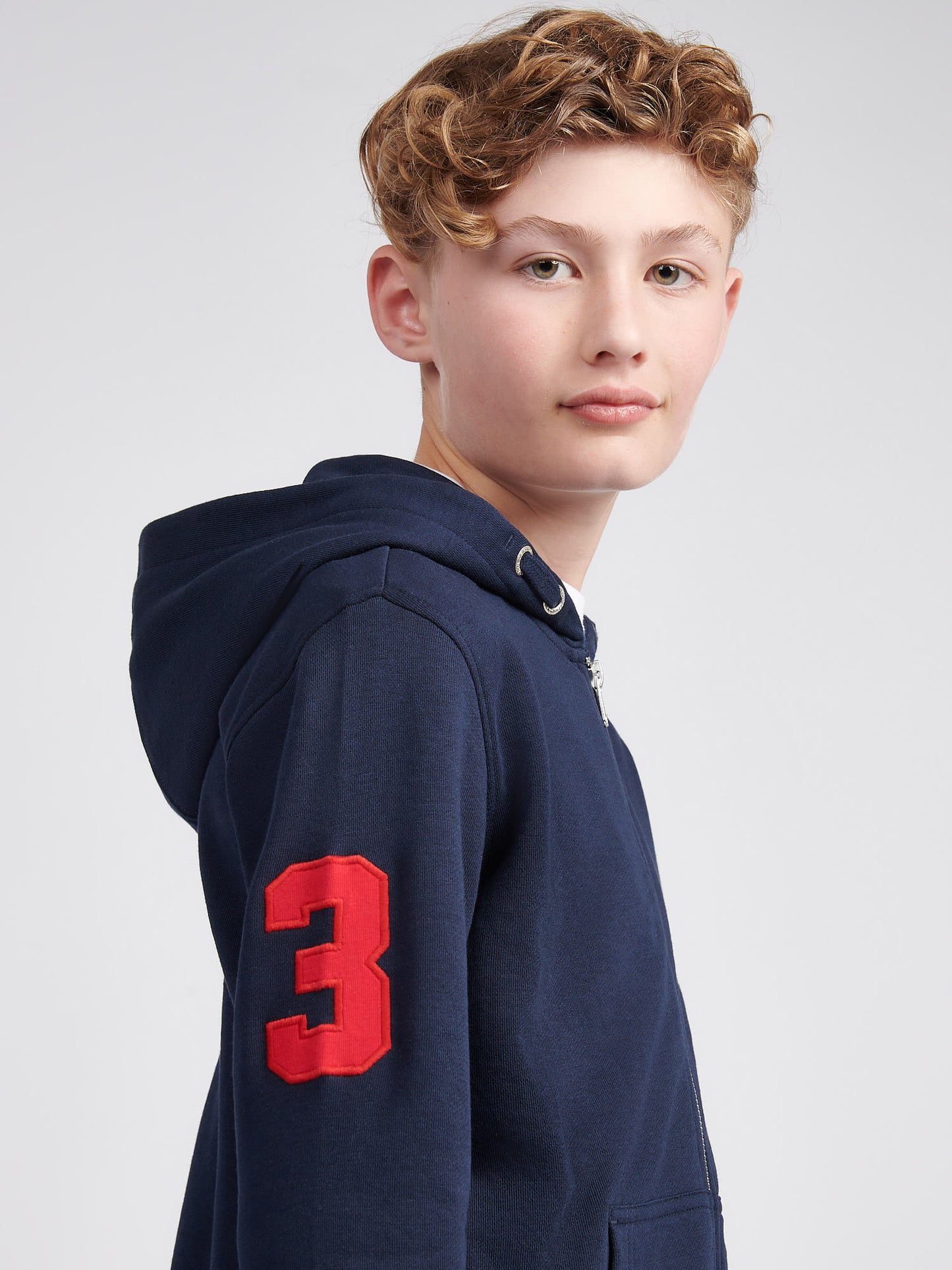 Boys Player 3 Zip Hoodie in Dark Sapphire Navy / Haute Red DHM